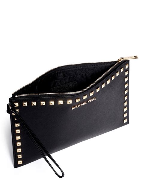 michael kors logo clutch|michael kors clutch sale.